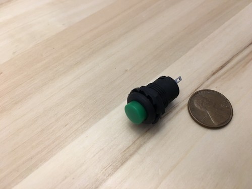 Latching 12mm green push
